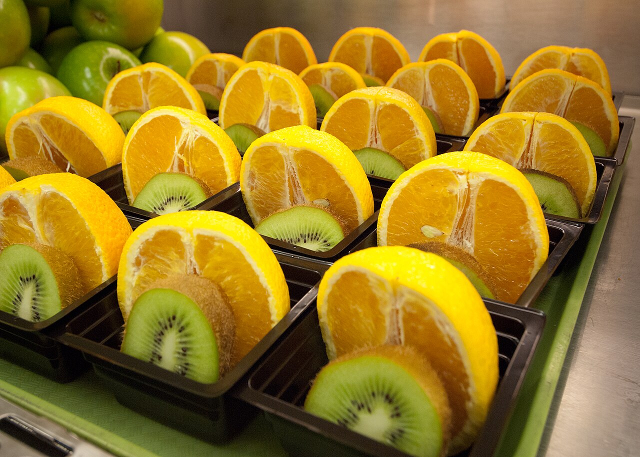 Fresh fruit cups set out for a school breakfast program