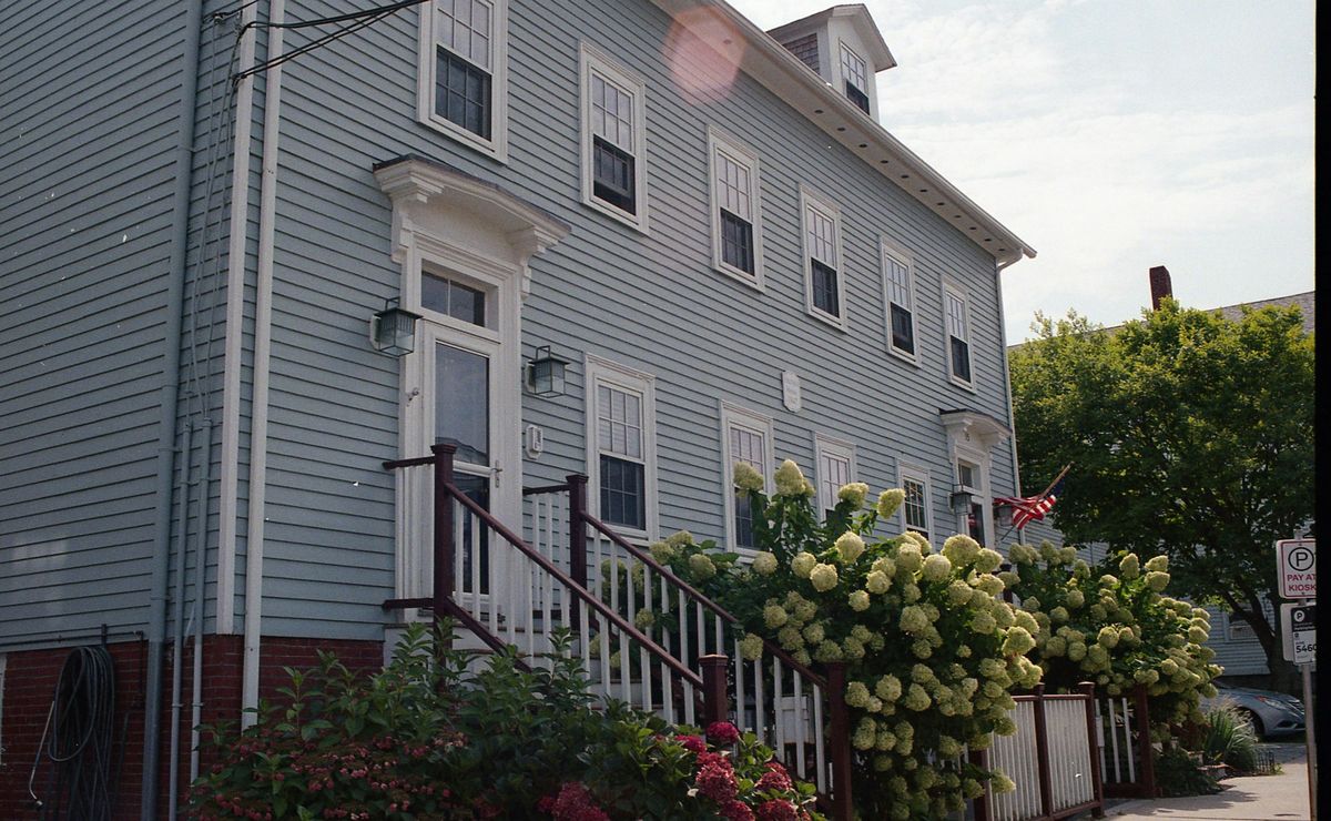 Blue house with white trim